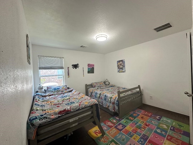 bedroom with a textured ceiling