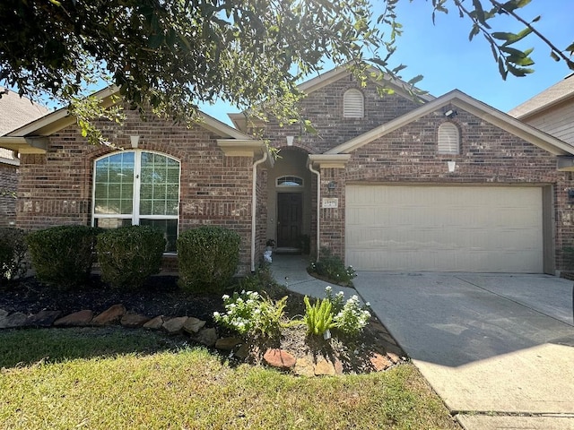 front of property featuring a garage