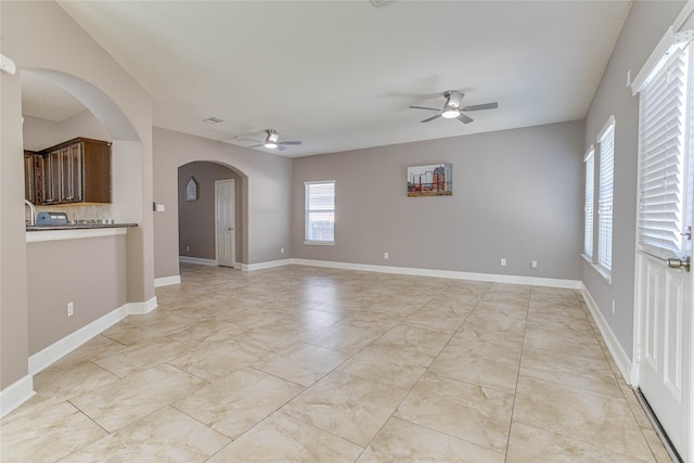 spare room with ceiling fan