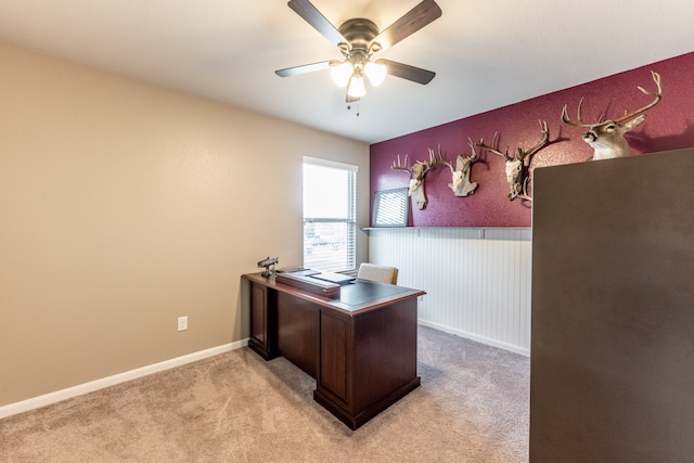 office space with ceiling fan and light colored carpet