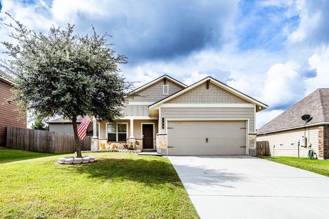 view of front facade with a garage and a front yard