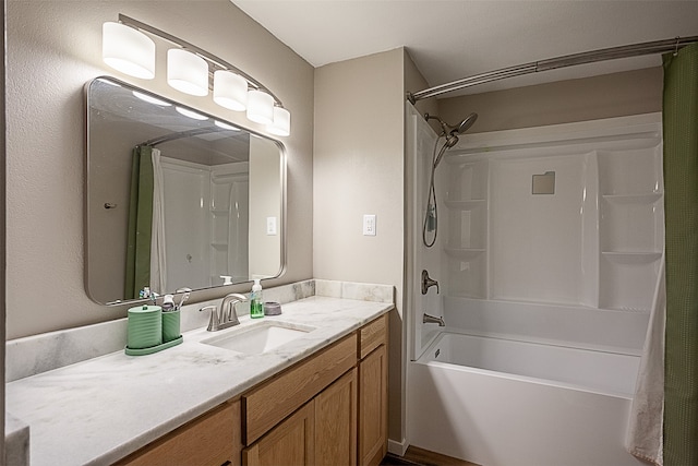 bathroom with shower / bathtub combination with curtain and vanity