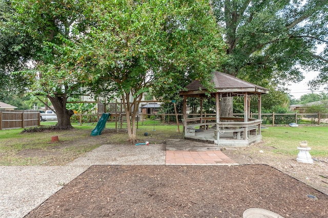 view of yard featuring a playground and a gazebo