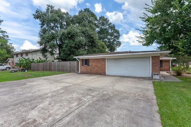 garage with a lawn