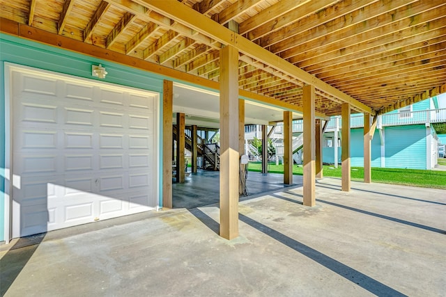 view of patio / terrace featuring a garage