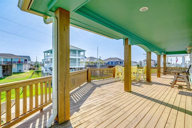 wooden deck with a residential view