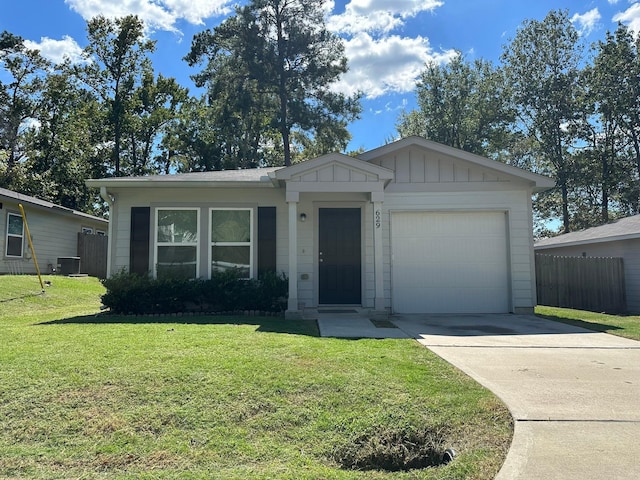 single story home featuring central AC, a garage, and a front lawn