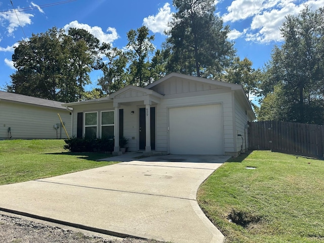 ranch-style home with a front yard and a garage