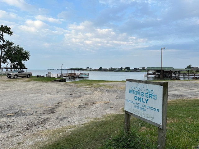 dock area featuring a water view