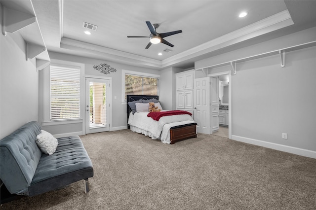 bedroom with a tray ceiling, ceiling fan, access to exterior, and crown molding