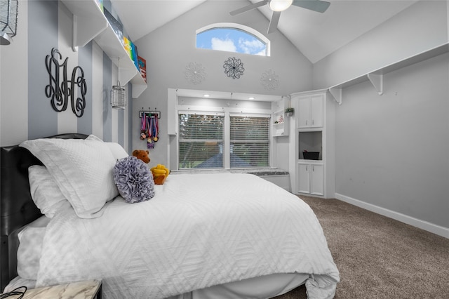 bedroom with carpet floors, ceiling fan, and high vaulted ceiling