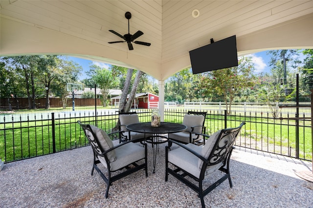 view of patio featuring ceiling fan