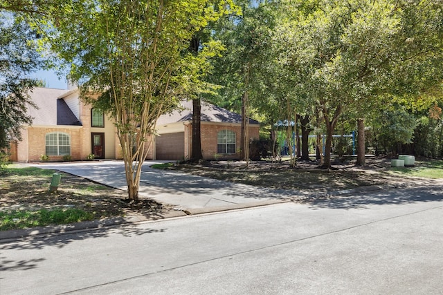 view of front of property with a garage