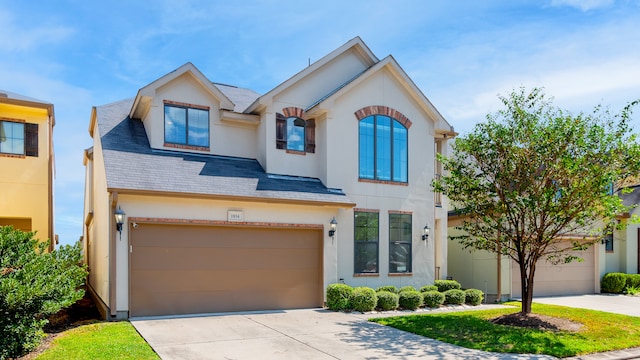 view of front of home with a garage