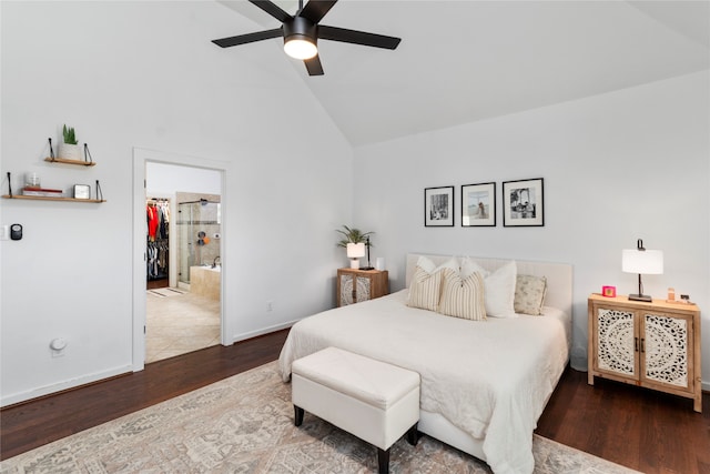 bedroom with hardwood / wood-style floors, a spacious closet, high vaulted ceiling, and ceiling fan