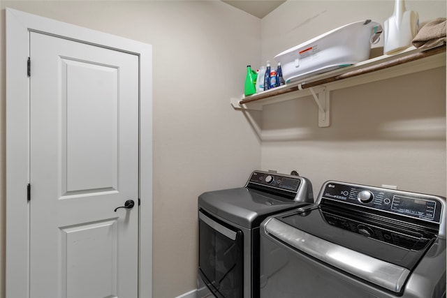 laundry area featuring washer and clothes dryer