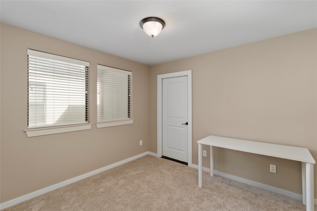 view of carpeted spare room