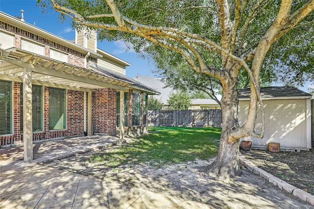 view of yard featuring a pergola and a patio