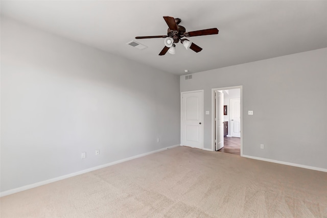 unfurnished bedroom with ceiling fan and carpet floors