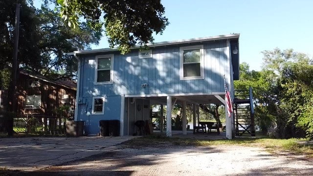 view of front of property with a carport