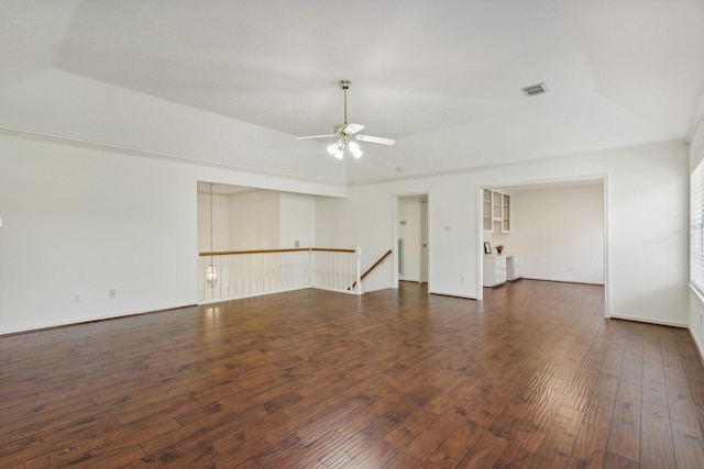 unfurnished room featuring dark hardwood / wood-style floors and ceiling fan