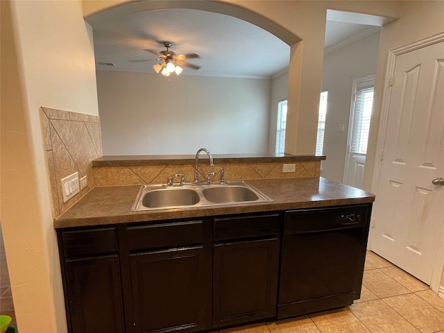 kitchen with black dishwasher, sink, light tile patterned floors, ornamental molding, and ceiling fan