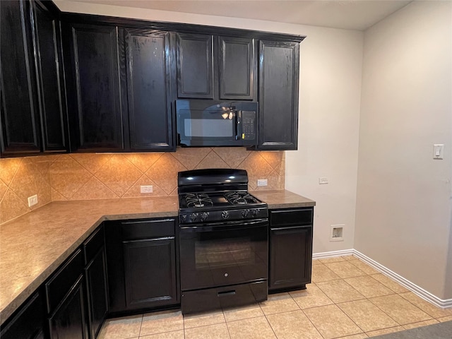 kitchen with black appliances, backsplash, and light tile patterned floors