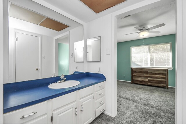 bathroom featuring vanity and ceiling fan