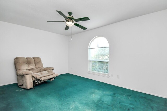 unfurnished room with carpet floors and ceiling fan