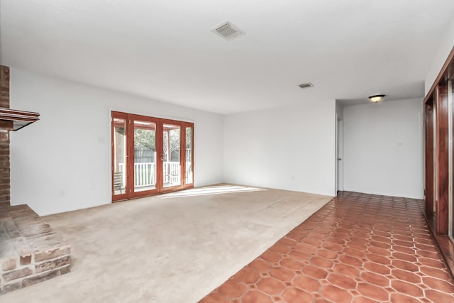 unfurnished living room with a fireplace