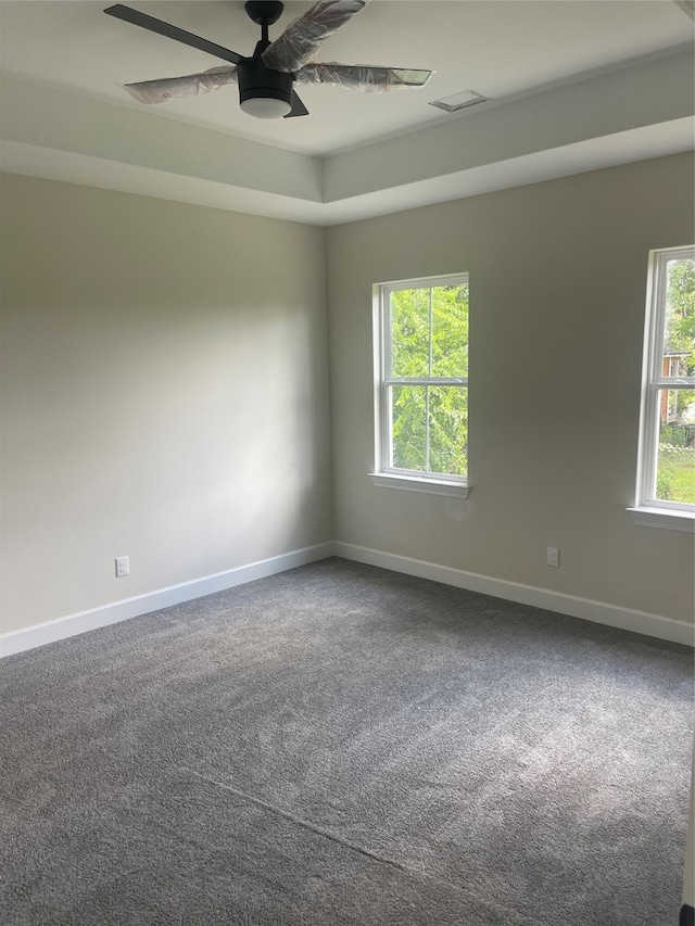 carpeted empty room with ceiling fan