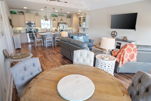 dining area with dark hardwood / wood-style floors