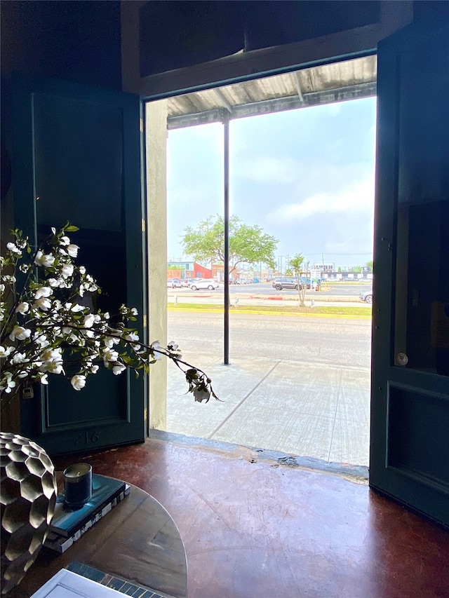 entryway featuring concrete floors