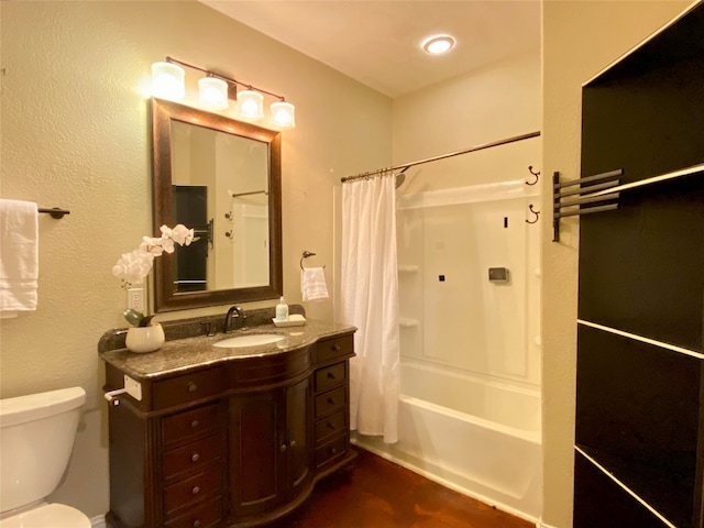 full bathroom with vanity, toilet, and shower / bath combination with curtain