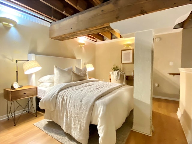 bedroom with light wood-type flooring