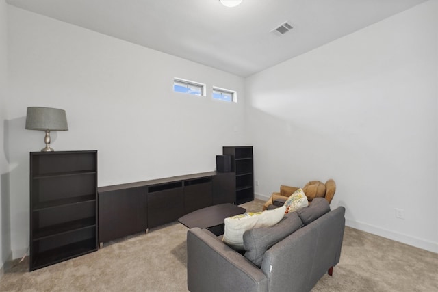 living area with light carpet