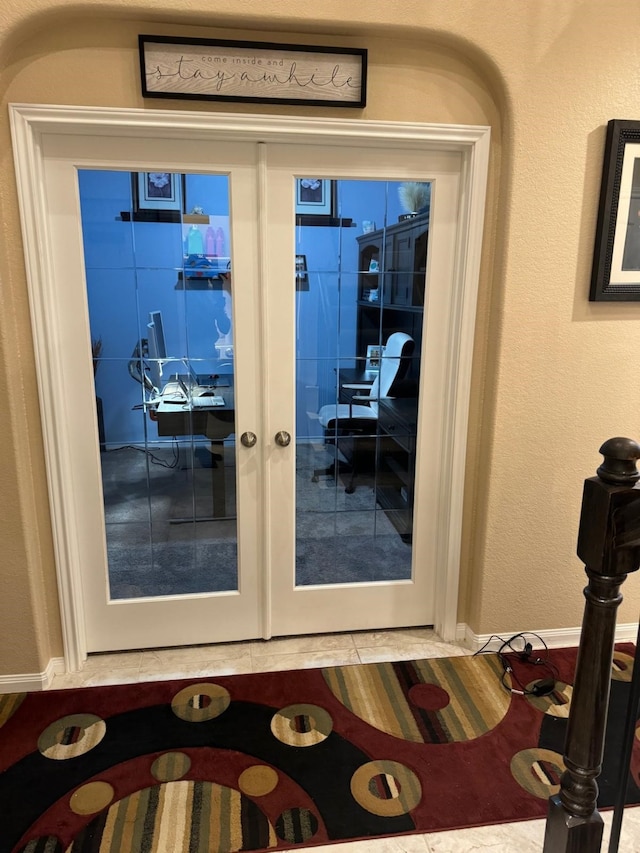 property entrance featuring french doors