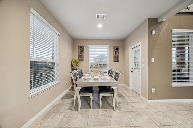 dining room featuring light tile patterned floors