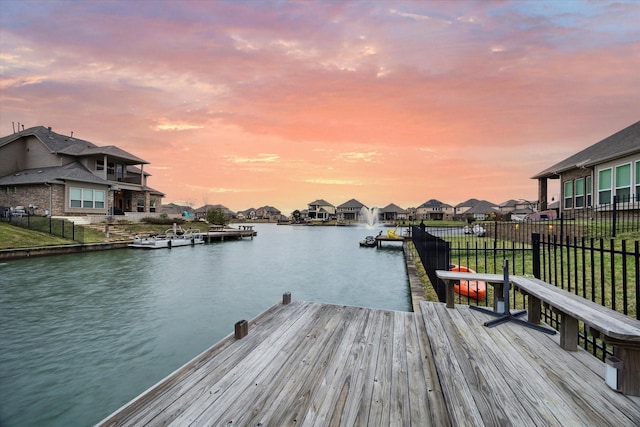 dock area with a water view