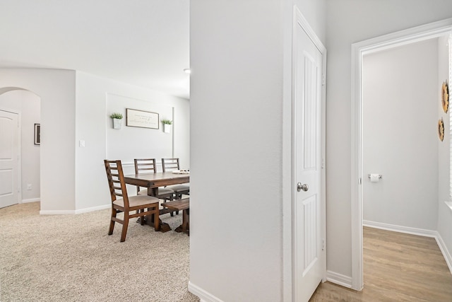 dining room with light wood-type flooring