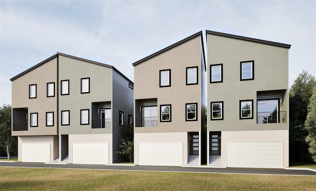 exterior space featuring a front yard and a garage