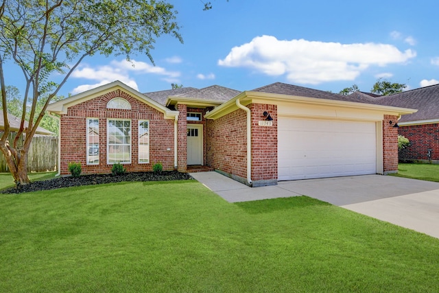 ranch-style house with a front yard and a garage