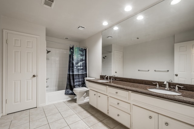 full bathroom featuring shower / bath combo, vanity, toilet, and tile patterned floors