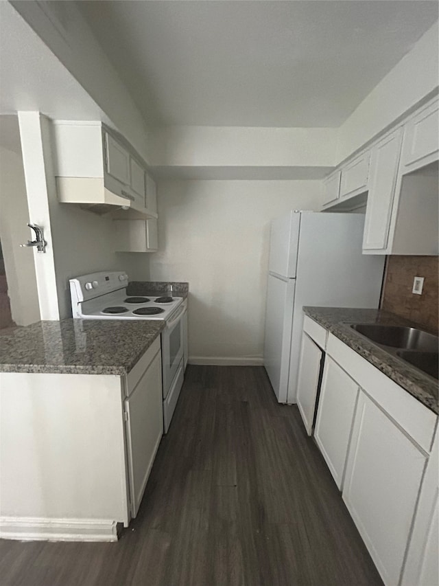 kitchen with white electric range, sink, dark wood-type flooring, and white cabinetry