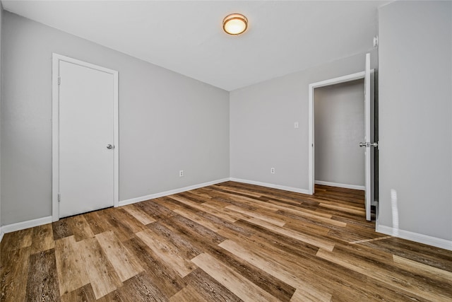 empty room featuring hardwood / wood-style flooring