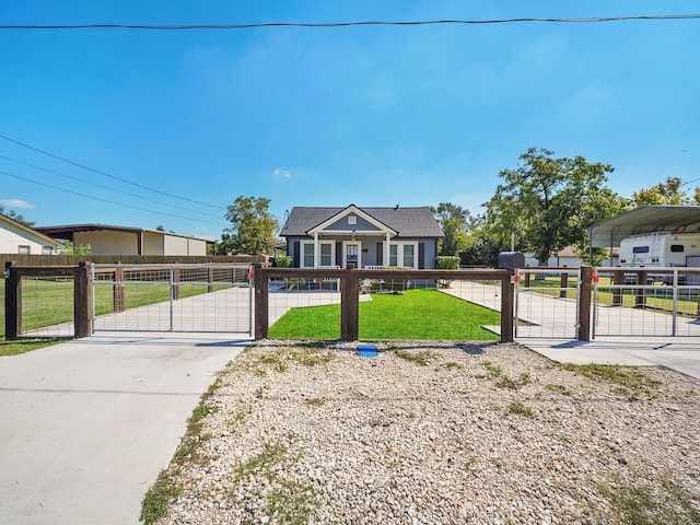 bungalow-style home with a gate, fence private yard, a carport, and a front yard