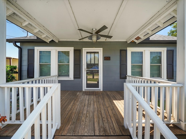 wooden deck with ceiling fan