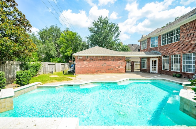 view of swimming pool featuring a patio