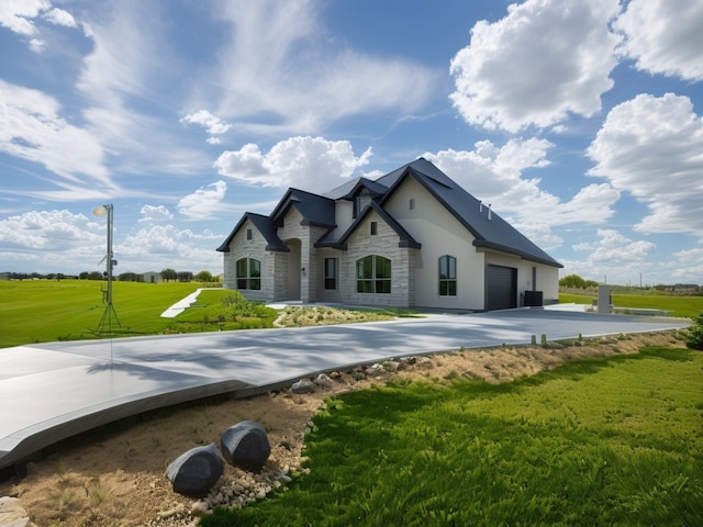 french country inspired facade featuring a front lawn and a garage