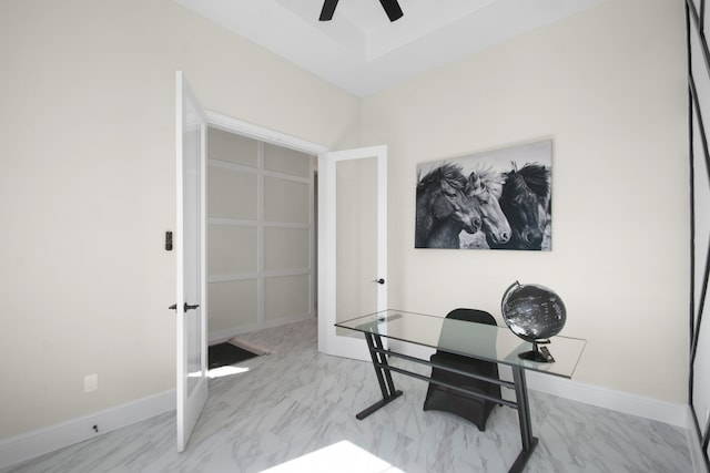 home office featuring french doors and ceiling fan